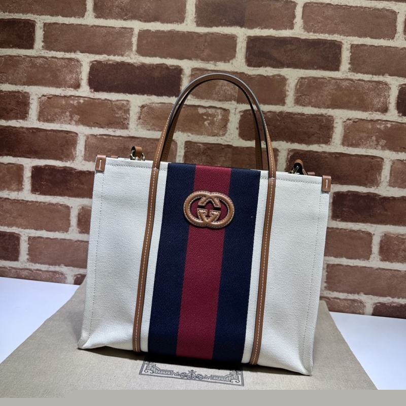 G*u*i shopping bags